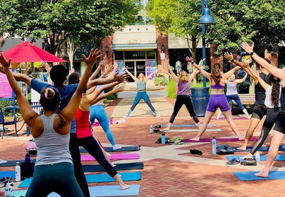 Yoga on the plaza at Fairfax Corner